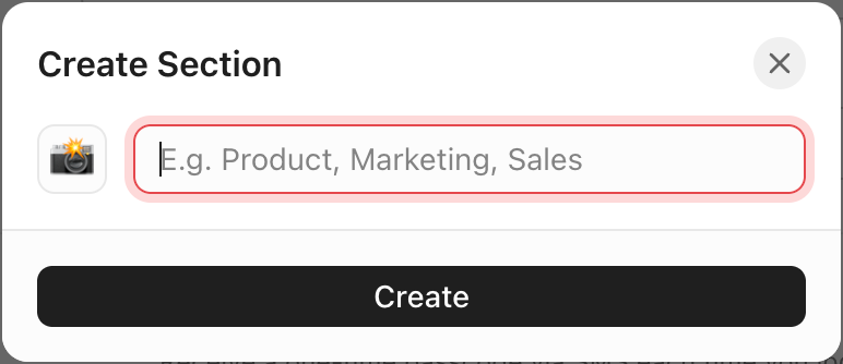 Screenshot del menu Crea sezione. È stata selezionata un'emoji fotocamera e il cursore si trova nel campo del nome della sezione.png