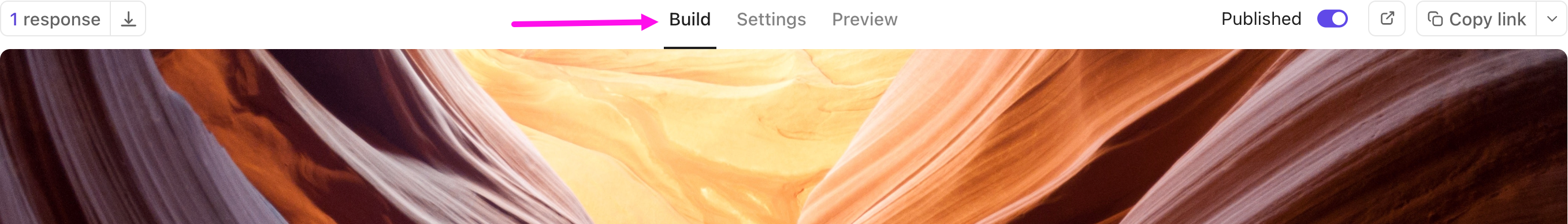 Screenshot della scheda Costruisci con un'immagine di copertina che raffigura un paesaggio desertico.