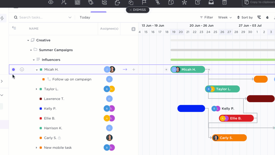 Gif of someone changing several task statuses at once using the Bulk Action Toolbar in Gantt view.